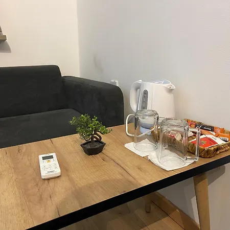 Hotel de apartamente E - One